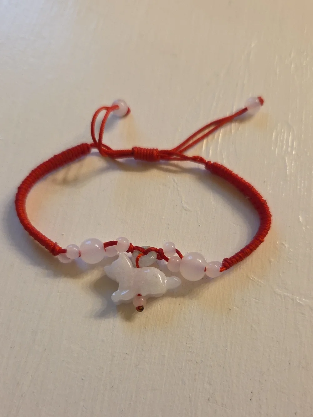 Red Cord Bracelet with White Bead Wolf Charm